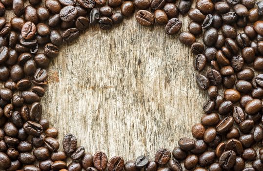 Coffee on grunge wooden background.