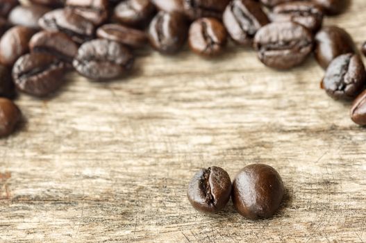 Coffee on grunge wooden background.