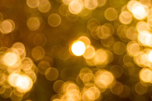 Bokeh gold colour abstract background.