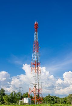 Telecommunication Radio Antenna Tower with blue sky with cloud.