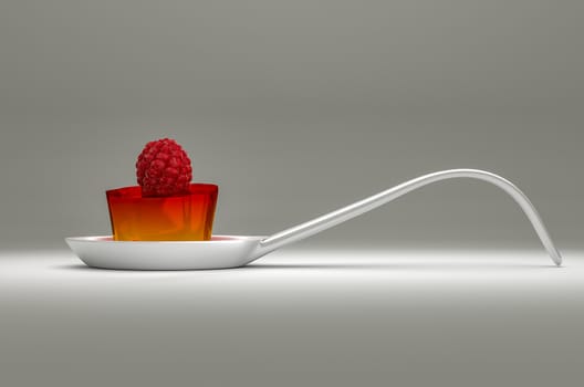 china spoon with gradient jelly from red to yellow and raspberry on the top as decoration