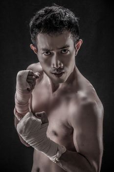 Portrait of Asian man- Topless, boxer concept