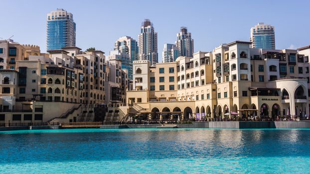 Mix of architectural styles in Dubai downtown, on February 3, 2013. City has a wide collection of buildings and structures of various architectural styles.