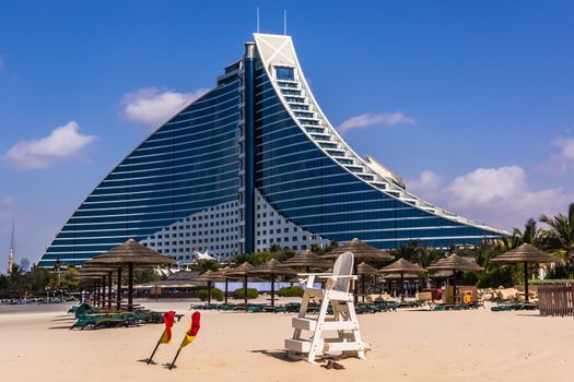 Jumeirah Beach Hotel in Dubai, preceded by the beachfront, on February 3, 2013. Well-known for its wave-shaped silhouette, remains one of the best recognizable landmarks of Dubai, UAE