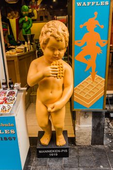 Plastic replica of the Manneken Pis (Peeing Boy) used for waffles advertisement,  on May 02, 2013 in Brussels. Legendary symbol of Brussels is widely used for marketing purposes across the city