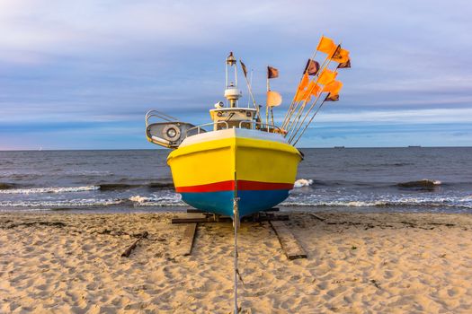 Fishing boat on the beach in Sopot, Poland.