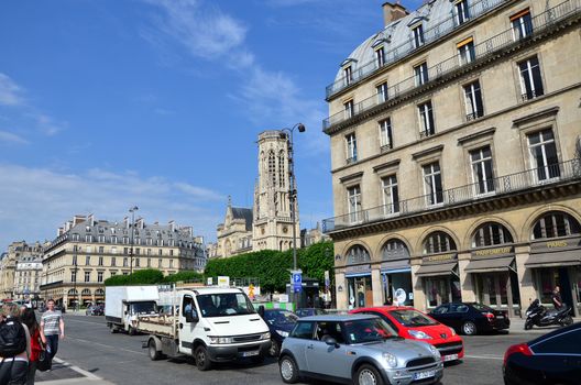 Paris, France - May 13, 2015: Tourists visit the center of Paris on May 13, 2015. Paris is the home of the most visited art museum in the world.