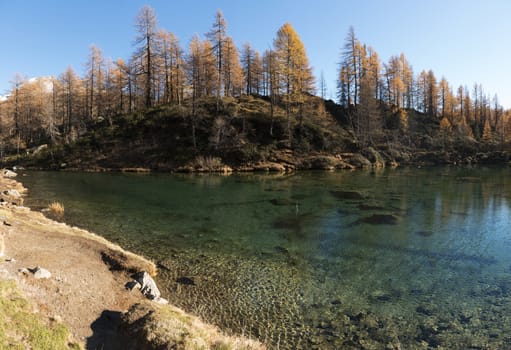 Lake of the witches in the natural park of Devero Alp in a beautiful autumn day, Piedmont - Italy