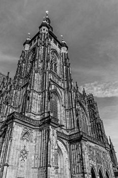 The Metropolitan Cathedral of Saints Vitus, Wenceslaus and Adalbert, a stunning example of Gothic architecture containing the tombs of Bohemian kings and Holy Roman Emperors.