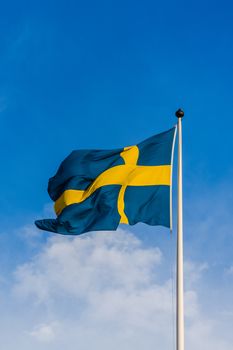 Swedish flag waving in the wind.