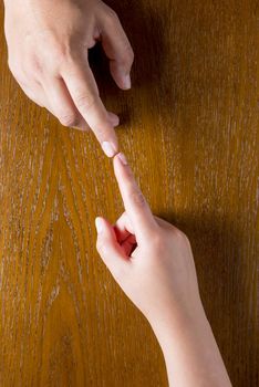 male and female finger joined Photo closeup