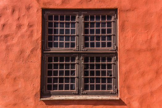 Window of Malmo Castle ( Malmöhus) in Malmo, Sweden. Old fortress founded in 1434 by King Eric of Pomerania, demolished and rebuilt in early 16th century, main landmark of the city.