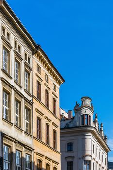 Facades of ancient tenements in the Old Town in Krakow, Poland.
