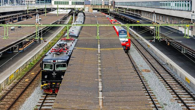 Trains at the platform of the Stockholm Central Station, the largest railway station in Sweden opened July 18, 1871. The station handles over 170.000  travelers daily.