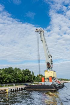 Floating crane on July 11, 2013 in the Port of Gdansk, the largest seaport in Poland, a major transportation hub in the central part of the southern Baltic Sea coast.