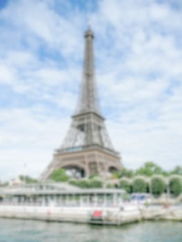 Defocused background of the Tour Eiffel in Paris, France. Intentionally blurred post production for bokeh effect
