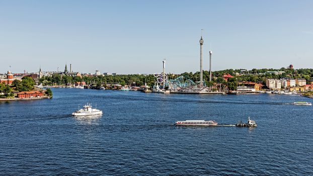 Grona Lund amusement park with a unique location on the Djurgarden island in Stockholm. The park is located amongst the old 19th century buildings originally designed  not for the park.