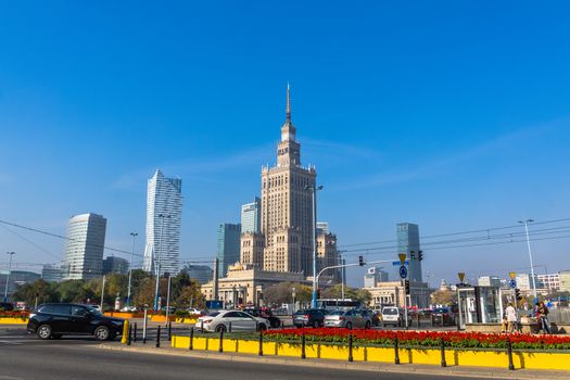 Palace of Culture and Science in Warsaw, built in socialism realism style, as a gift for Poland from USSR in 1955, surrounded by modern skyscrapers  on October 09, 2013.