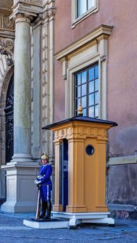 The wardress on duty in front of the Royal Palace in Stockholm. The Royal Guard was established in 1523 and continuously guards the Royal Palace since then.