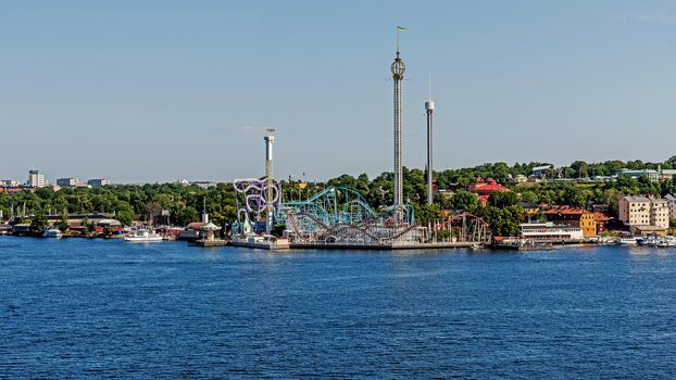 Grona Lund amusement park with a unique location on the Djurgarden island in Stockholm. The park is located amongst the old 19th century buildings originally designed  not for the park.
