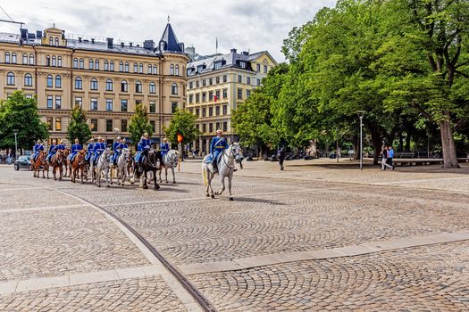 Squadron returns to barracks after changing of the guard at the Royal Palace in Stockholm. The Royal Guard was established in 1523 and continuously guards the Royal Palace since then.
