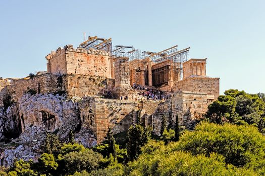The Acropolis of Athens, an ancient citadel on a high rocky hill above the city, home to the remains of  ancient buildings of great architectural and historic significance.