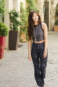 Bohemian girl wandering on the street