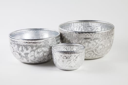 Decorated pattern silver bowl on white, isolated