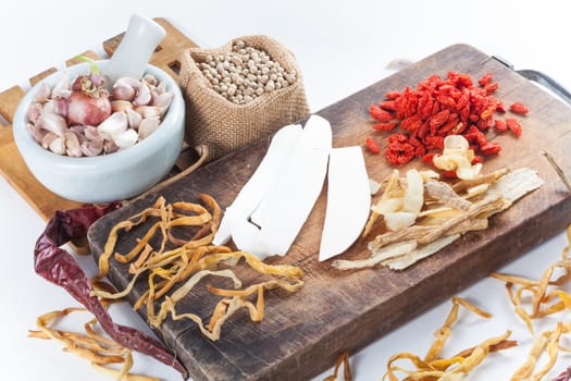 Still life of asia seasoning on white - Set of Chinese herb for making original Chinese soup