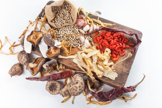 Still life of asia seasoning on white - Set of Chinese herb for making original Chinese soup