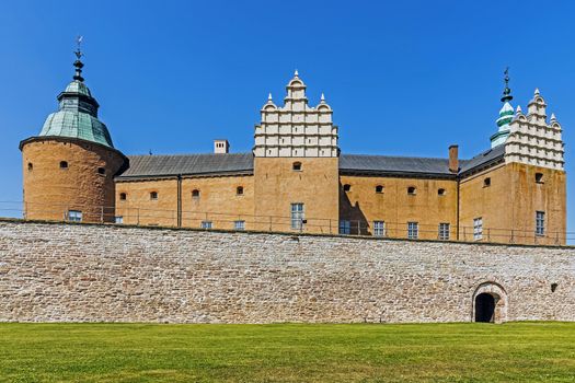 The Kalmar Castle preceded by the lawn. Castle dates back 800 years and reached its current design during the 16th century when rebuilt by Vasa kings.