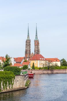 Distant view on The Cathedral of St. John the Baptist, the seat of the Roman Catholic Archdiocese of Wrocław, Poland. The Gothic church with Neo-Gothic additions is located in the Ostrow Tumski the oldest part of the city.