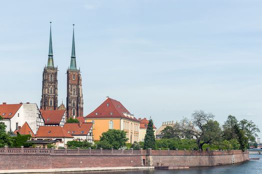 Distant view on The Cathedral of St. John the Baptist, the seat of the Roman Catholic Archdiocese of Wrocław, Poland. The Gothic church with Neo-Gothic additions is located in the Ostrow Tumski the oldest part of the city.