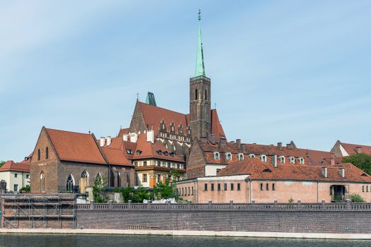 Distant view on The Church of the Holy Cross. The Gothic church is located in the Ostrow Tumski the oldest part of the city.