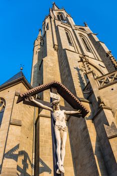 Statue of Jesus Christ crucified in front of the Church of the Immaculate Conception of the Blessed Virgin Mary in Katowice, Silesia region, Poland.