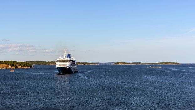 Ferry approaches The Port of Nynashamn. The city is a big center for ferry transport and also a well-known place of sailing events.