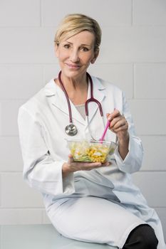 woman doctor having lunch break