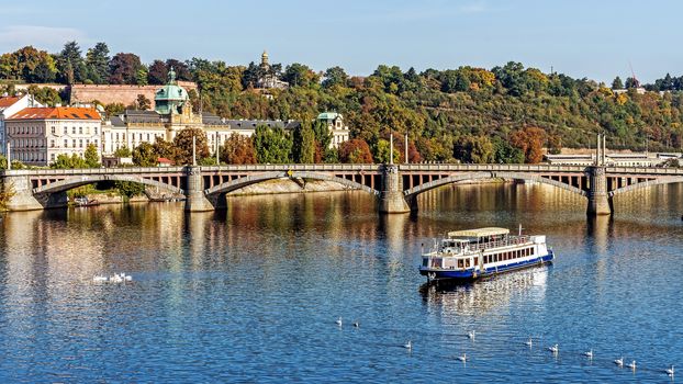 View on the Vltava River in Prague, the capital of the Czech Republic, home to many attractions, the Prague Castle, the Charles Bridge, Old Town and St. Vitus Cathedral.