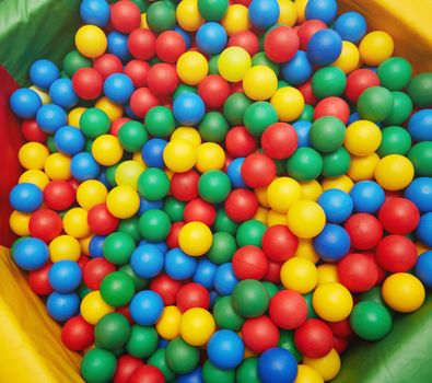 Group of many multicolored plastic balls. Close-up view