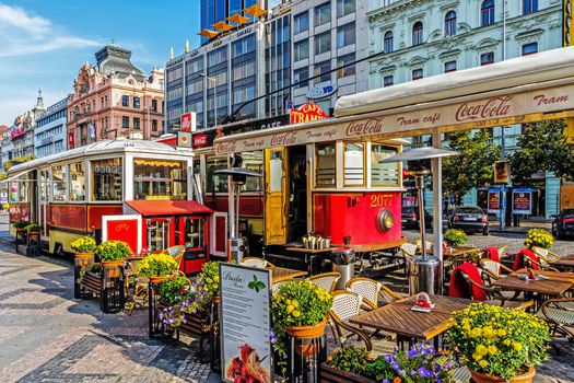Outdoor restaurant at Wenceslas Square (Czech: Vaclavske namesti) in Prague, main city square, business and cultural center, named after Saint Wenceslas, the patron of Bohemia.