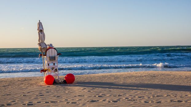 Life guard on a beach next to Burj Al Arab, Jumeirah Beach hotels and Wild Wadi water park, taken on February 03, 2013, UAE.