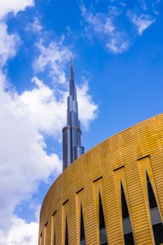 Burj Khalifa, the tallest man-made structure in the world, at 829.8 m, preceded by the fragment of the Dubai Mall,  the world's largest shopping center.