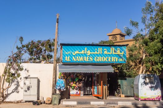 Small shop and modest mosque in Jumeirah district in Dubai. Scent of ordinary life, a few steps from luxurious resorts.