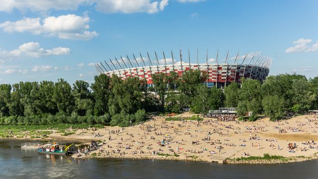 Polish National Stadium in Warsaw, on May 19, 2013 preceded by the beach on Vistula river bank.  Designed and constructed for UEFA EURO 2012 tournament co-hosted by Poland and Ukraine.