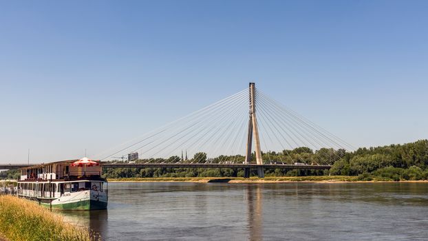 The Swietokrzyski Bridge over Vistula river, first modern cable-stayed bridge in Warsaw, 479 m long with the tower 90 m high, opened on October 06, 2000.