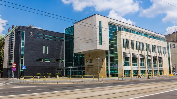 Seat of the Polish National Bank regional headquarters in Katowice. Referring to the local tradition, wall of the hall is covered with black tiles resembling a wall of coal.