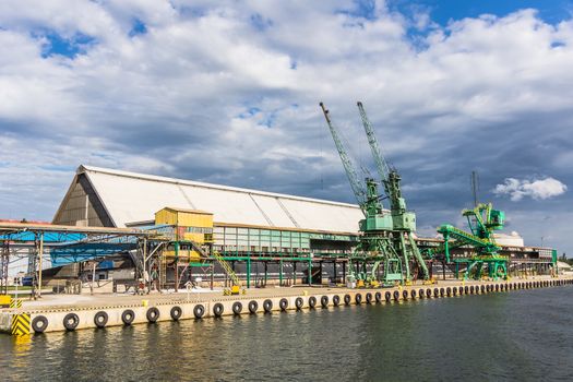 Cranes on the quay on July 11, 2013 in the Port of Gdansk, the largest seaport in Poland, a major transportation hub in the central part of the southern Baltic Sea coast.