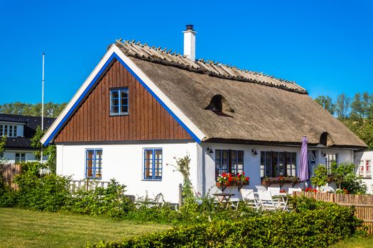 Colorful house in  Kaseberga, Sweden. Kaseberga is a small fishing village near Ystad,  well-known for Ales Stenar mysterious stone circle created 1400 years ago.