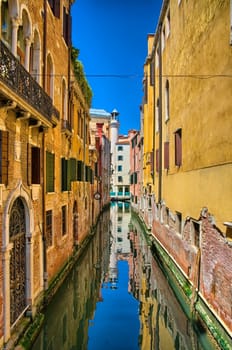 Scenic canal on sunny day, Venice, Italy