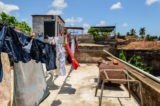 In the picture of the clothes hanging with rope on the terrace in Cuba.